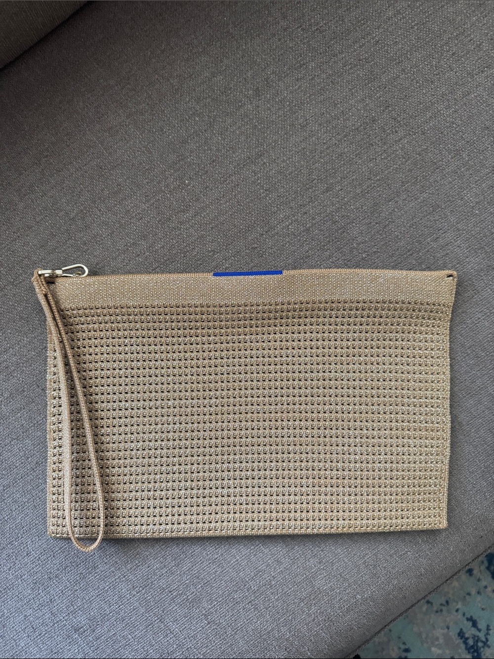 Woven Metallic Wristlet Clutch in Gold